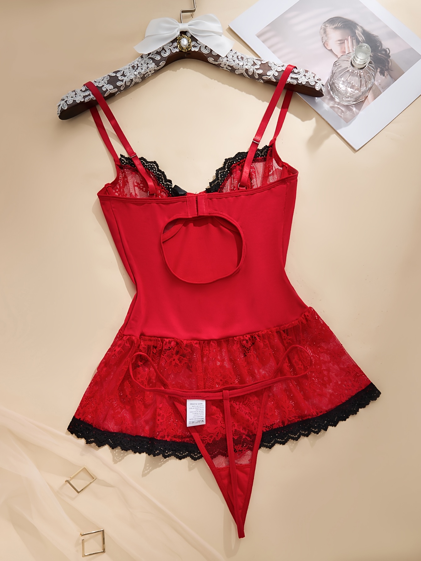 A Sweet, Cute, And Sexy Red And Black Short Nightgown Featuring Romantic Lace Trim And Tempting Bow Decorations. Purchase Includes a Matching Thong. The Deep V Design And Lace Transparency Make It Suitable for Parties, Dinners, Nightclubs - Image 3