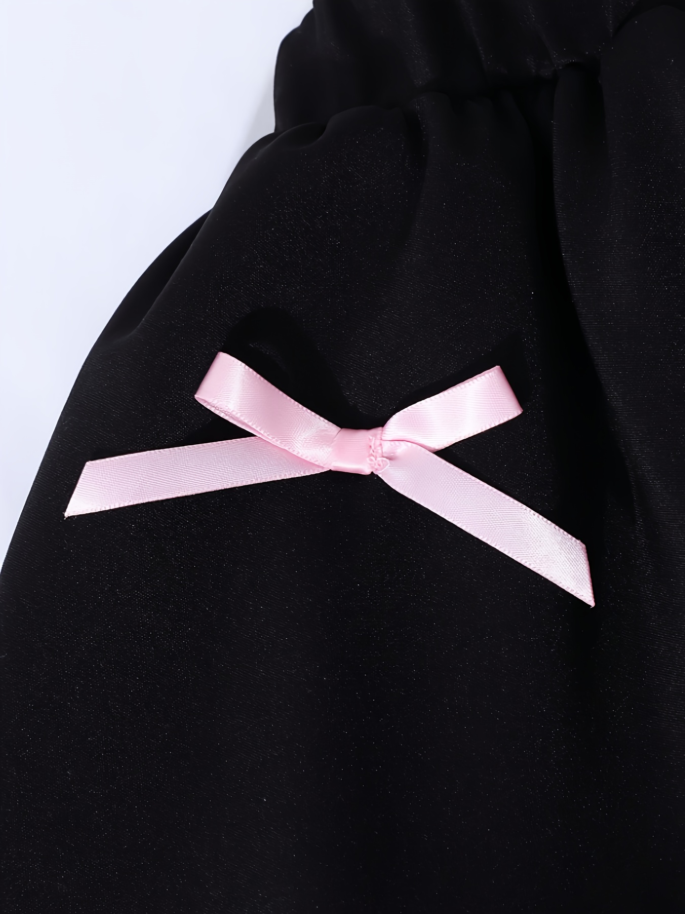 Spring/Autumn New Arrival for Girls: Fashionable and Elegant Off-shoulder Spaghetti Strap Top with a Three-dimensional Bow Decoration, Paired with a Two-tiered Cake Skirt Featuring Contrasting Color Bow Accents. A Comfortable and Stylish Set - Image 5