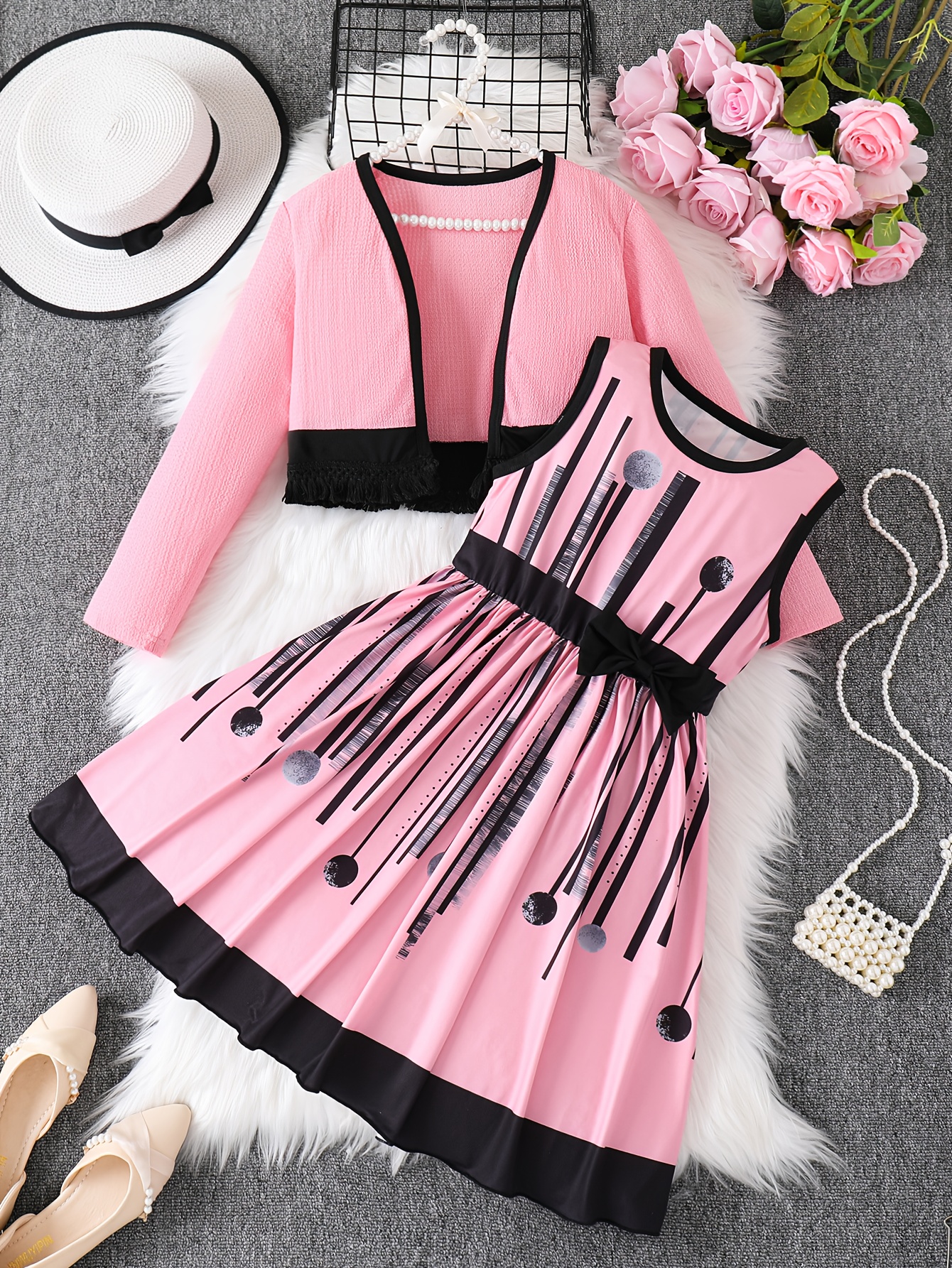 A Casual Dress for Girls Featuring a Random Print, Round Neck, And Bow, Paired with a Fringed Cardigan Set. Made from Comfortable, Skin-Friendly Fabric, It'S Perfect for Everyday Wear, Outdoor Activities, Parties, And Other Special Occasions